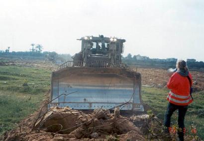 Rachel Corrie protests Israeli policy of home demolitions several hours prior to her killing - Rafah, Gaza - March 16, 2003_low